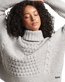 The Superdry Womens Chunky Cable Roll Neck Jumper in Off White