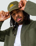 The Salt Water Seeker Mens Vibes Trucker in Khaki Moss